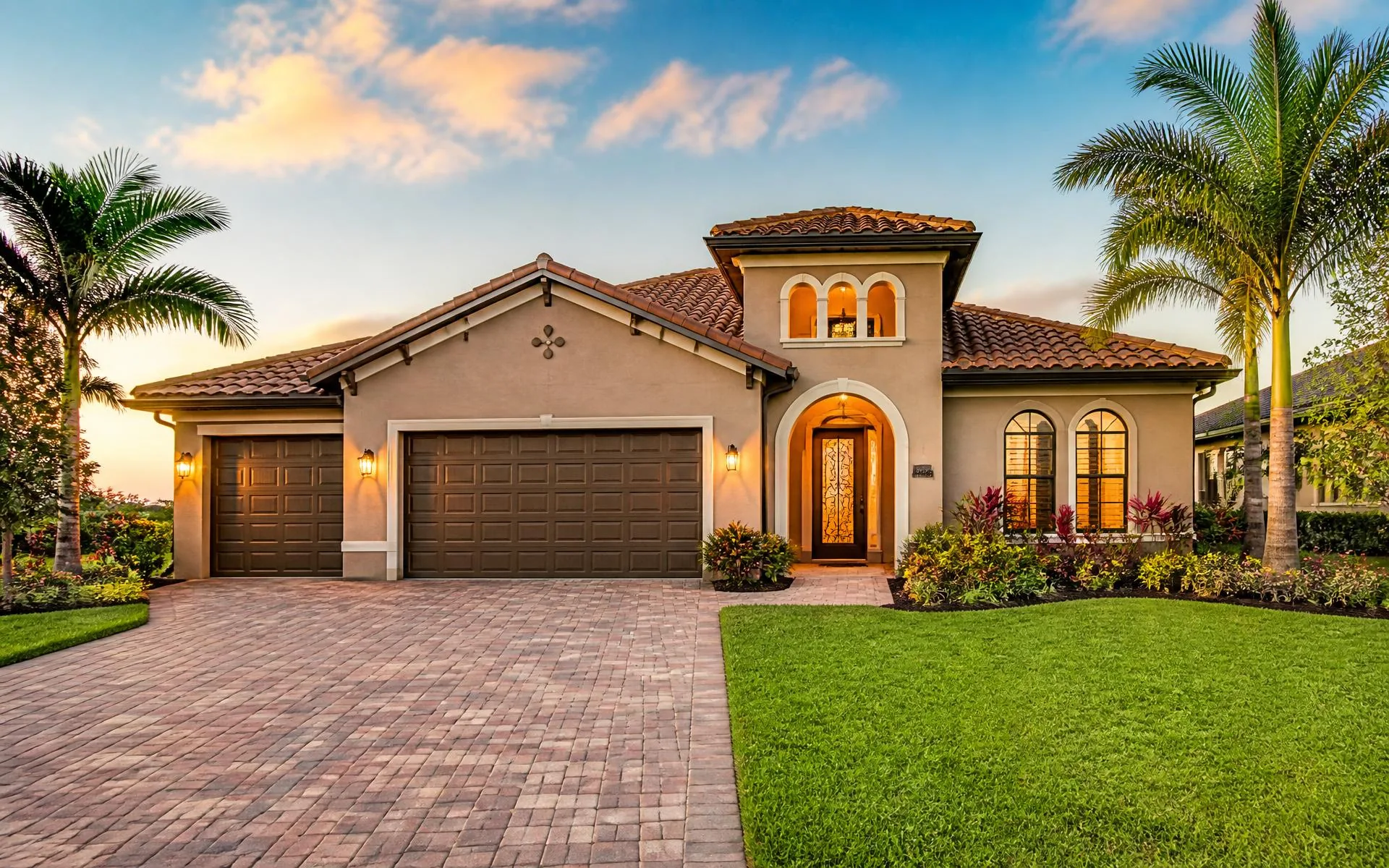 Sunlit Southwest Florida rental home framed by palm trees